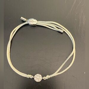 Signed, Fossil Circle Bracelet Powder 
Blue Cord, Adjustable